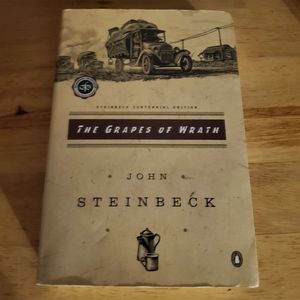 The Grapes Of Wrath by. John Steinbeck Paperback